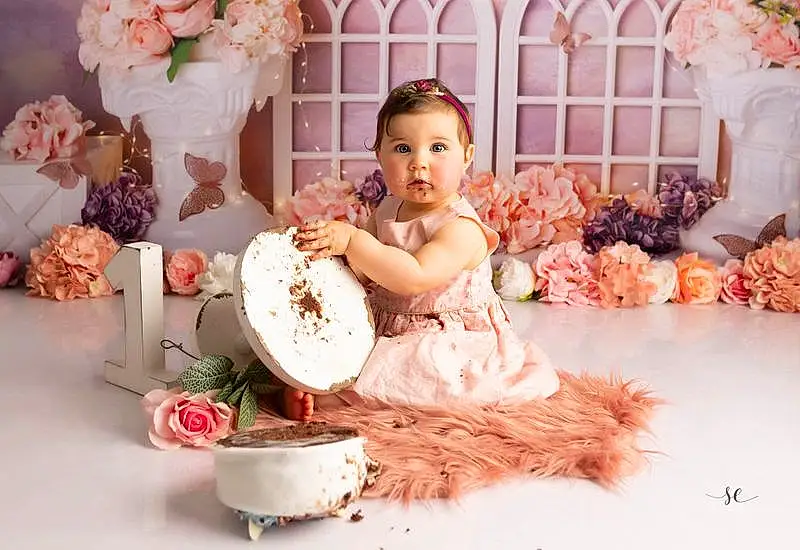 Dress, Textile, Bridal Clothing, Orange, Happy, Rose, Jouets, Wedding Ceremony Supply, Gown, Baby, Bambin, Beauty, Petal, Doll, Headpiece, Event, Enfant, Peach, Sweetness, Flower Arranging, Personne
