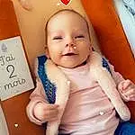 Joue, Peau, Sourire, Lip, Chin, Stomach, Eyebrow, Yeux, Mouth, Jambe, Baby & Toddler Clothing, Happy, Baby, Gesture, Rose, Finger, Headgear, Thumb, Bambin, Baby Playing With Toys, Personne