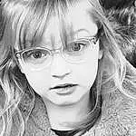 Eyewear, Hair, Visage, Lunettes, Coiffure, Eyebrow, Lip, Beauty, Blond, Nez, Chin, Black-and-white, Yeux, Cool, Monochrome, Child Model, Portrait, Forehead, Vision Care, Portrait Photography, Personne