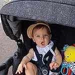 Peau, Black, Baby, Flash Photography, Chapi Chapo, Bambin, Baby & Toddler Clothing, Headgear, Baby Carriage, Comfort, People, Sun Hat, Happy, Enfant, Chair, Fun, Baby Products, Assis, Personne, Surprise