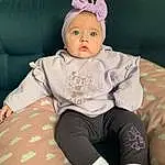 Baby & Toddler Clothing, Purple, Textile, Sleeve, Rose, Baby, Comfort, Bambin, Happy, Enfant, Costume Hat, Thigh, Knee, Human Leg, Magenta, Fashion Accessory, Assis, Headband, Pattern, Headpiece, Personne