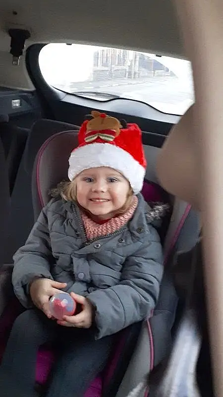 Mode Of Transport, Comfort, Hiver, Enfant, Carmine, Baby & Toddler Clothing, Bambin, Car Seat, Laugh, Baby, Tongue, Bonnet, Head Restraint, Beanie, Baby Laughing, Hood, Car Seat Cover, Noël, Fictional Character, Personne, Joy, Headwear
