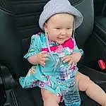 Peau, Hand, Jambe, Mouth, Dress, Cap, Baby & Toddler Clothing, Sleeve, Rose, Finger, Chapi Chapo, Cool, Baby, Bambin, Thigh, Steering Wheel, Car Seat, Fun, Auto Part, Magenta, Personne, Joy, Headwear