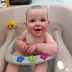 Joue, Peau, Mouth, Sourire, Baby Bathing, Baby Playing With Toys, Happy, Computer Keyboard, Bathing, Input Device, Baby, Finger, Peripheral, Baby & Toddler Clothing, Bambin, Fun, Baby Products, Baby Laughing, Enfant, Office Equipment, Personne, Joy