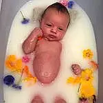 Visage, Joue, Peau, Head, Hand, Stomach, Mouth, Jambe, Human Body, Baby, Fluid, Rose, Baby Bathing, Bambin, Bathing, Baby & Toddler Clothing, Chest, Nail, Thumb, Personne