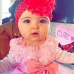Peau, Photograph, Dress, Baby & Toddler Clothing, Rose, Happy, Headgear, Cap, Baby, Magenta, Red, Entertainment, Bambin, Headpiece, Beauty, Costume Hat, Jewellery, Necklace, Headband, Fun, Personne, Headwear