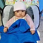 Visage, Peau, Comfort, Baby & Toddler Clothing, Baby, Chair, Cap, Bambin, Baby Carriage, Leisure, Electric Blue, Assis, Baby Products, Baby Safety, Happy, Enfant, Linens, Fashion Accessory, Knit Cap, Personne, Headwear