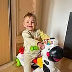 Riding Toy, Sourire, Wheel, Baby & Toddler Clothing, Tire, Happy, Baby Playing With Toys, Bambin, Jouets, Enfant, Baby, Beauty, Fun, Bois, Cleanliness, Assis, Play, Plastic, Hardwood, Personne, Joy