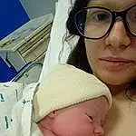 Forehead, Lunettes, Visage, Nez, Joue, Peau, Lip, Chin, Hand, Eyebrow, Mouth, Photograph, Facial Expression, Vision Care, Eyelash, Baby Sleeping, Comfort, Baby, Personne